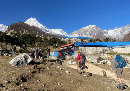 trekkers during a climb to pungyen gompa in manaslu