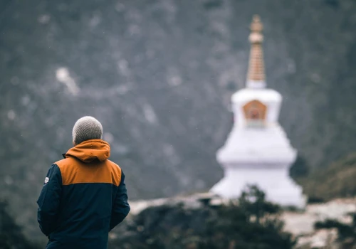 a man near chorten in everest region