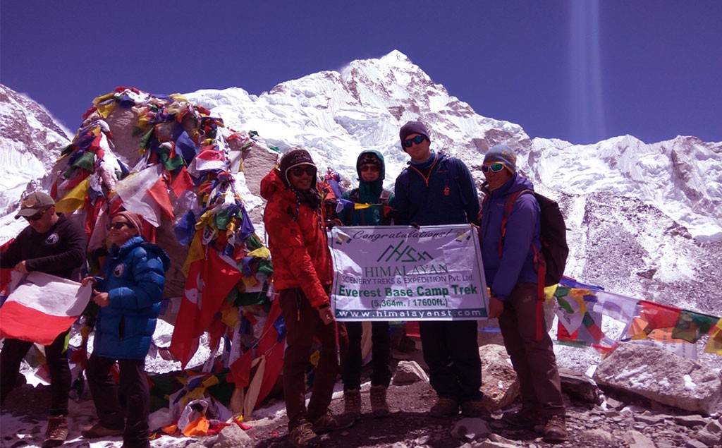 everest base camp with company flag