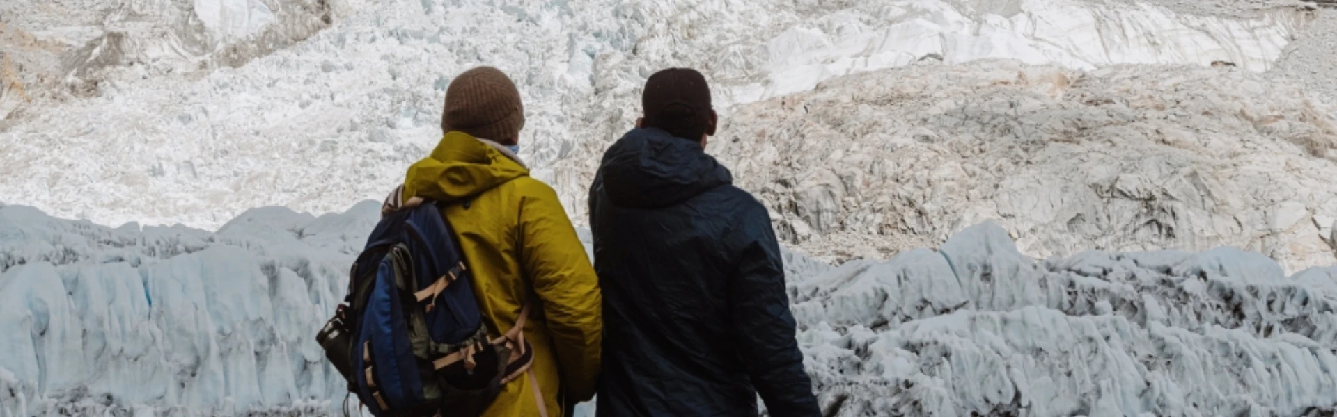 a guide explains about himalayas to his client in ebc