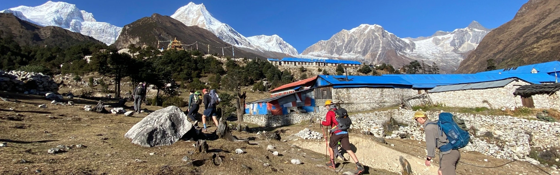 trekkers during a climb to pungyen gompa in manaslu