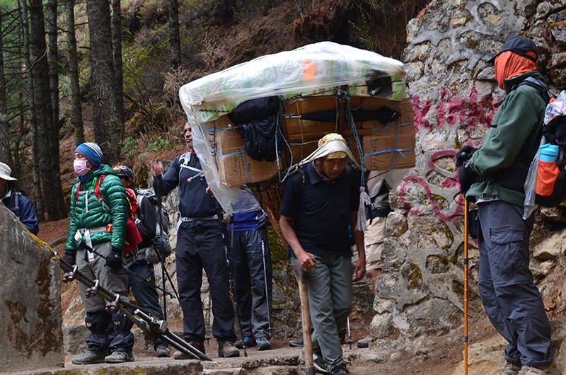 Porters Carrying Supplies