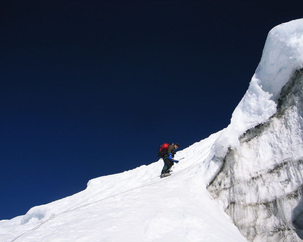 A climber nears the summit of Island Peak.