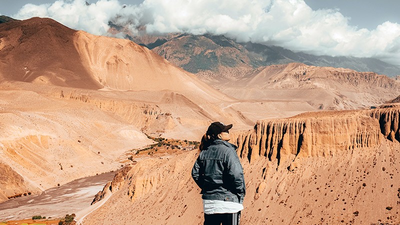 Solo Backpacker Enjoying the Views in Mustang