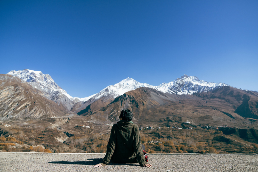 a man relaxes in mustang