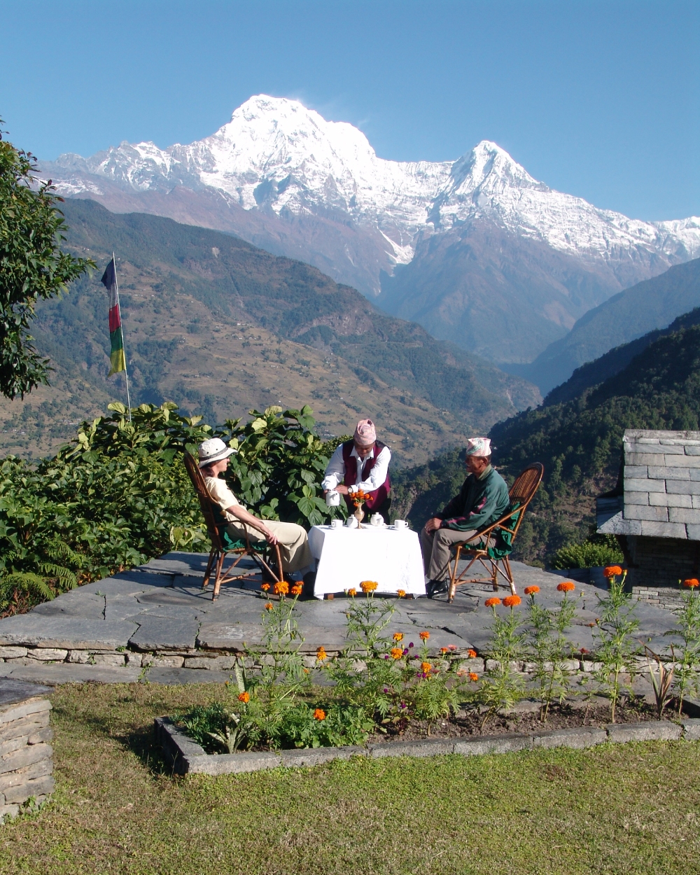 guests being served breakfast with himalayan view in nepal