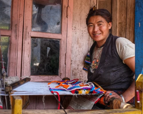 A Lady Making Herself A Rug