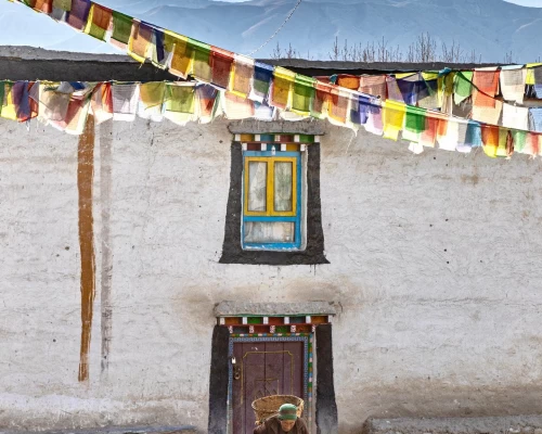 An Old Lady Doing Her Regular Chores In Lo Manthang