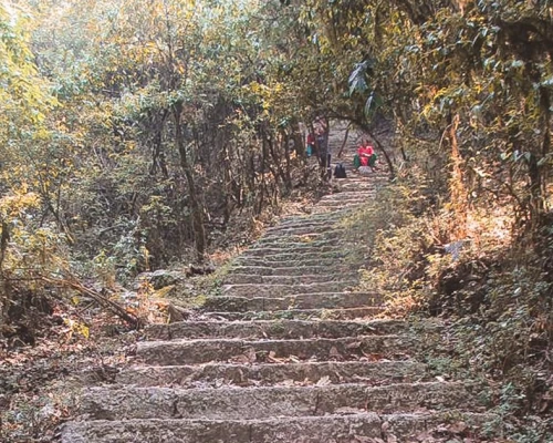 Hiker Resting On The Way To Chisapani