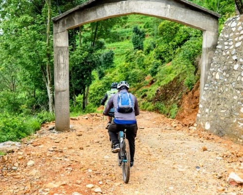 Mountain Bikers Ride Their Bike In Kathmandu Biking Trail
