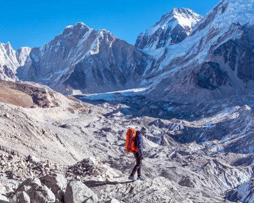Trekker Stands Near Everest Base Camp Making His Way